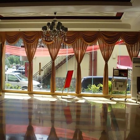 An E Courtyard Hotel Jiu Zhai Gou Branch Цзючжайгоу Экстерьер фото